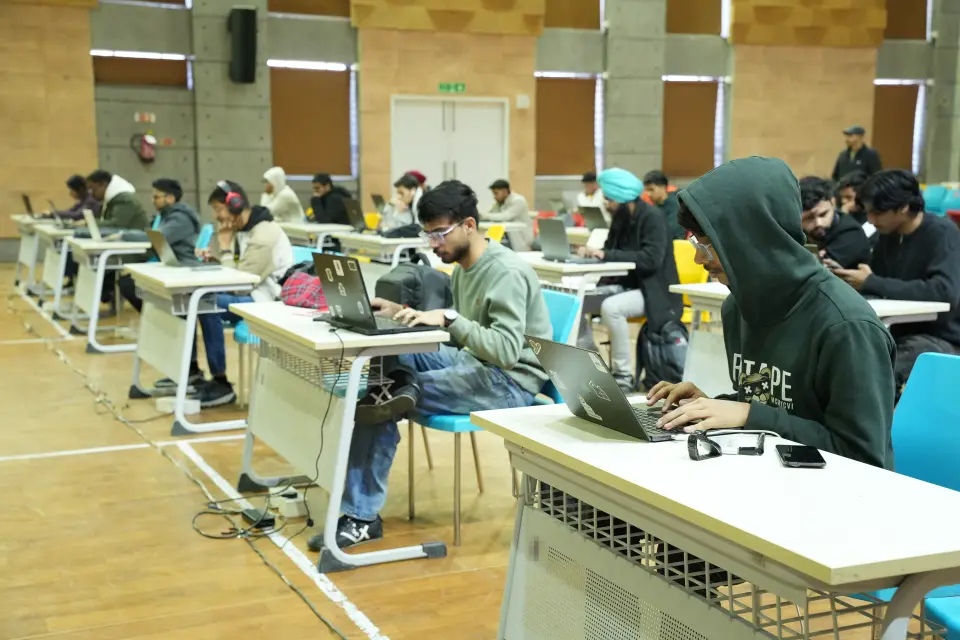 Teams playing the CTF in a large hall